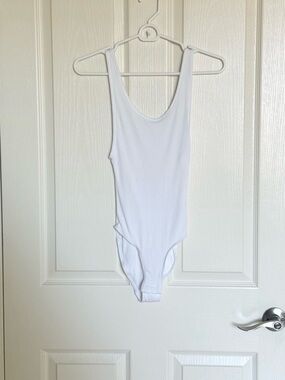 Urban Outfitters: White Ribbed One-Piece bodysuit - Size XS